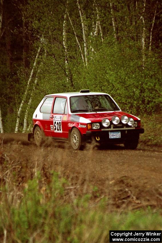John Adleman / Jason Lajon drift their VW GTI through a fast sweeper in the Two Inlets State Forest.