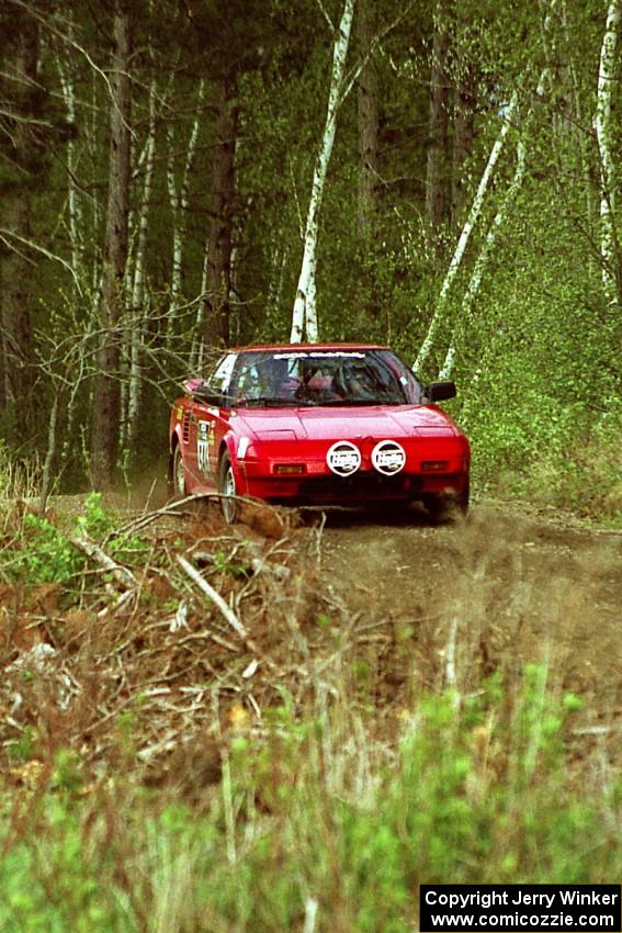 Phil Schmidt / Steve Irwin at speed in their Toyota MR-2 in the Two Inlets State Forest.