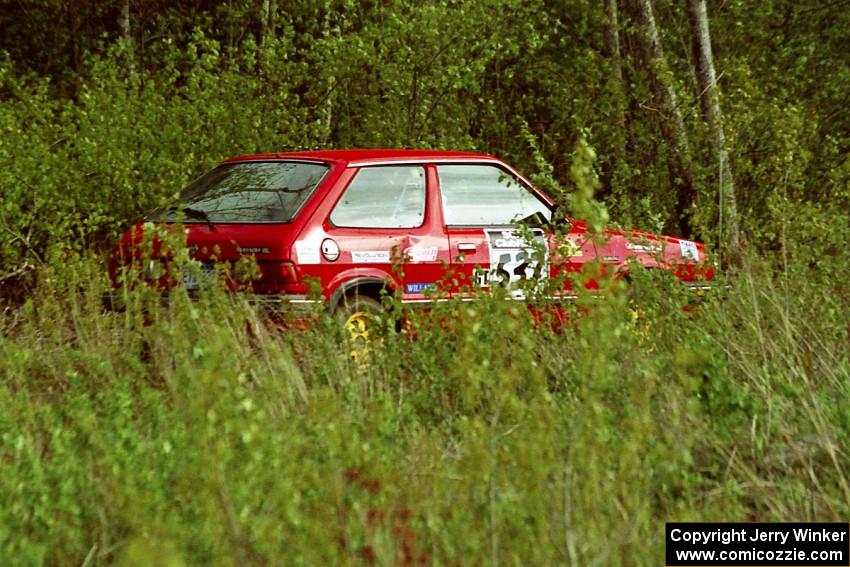 The Paul Peters / Bob Anderson Subaru GL drives through the Two Inlets State Forest.