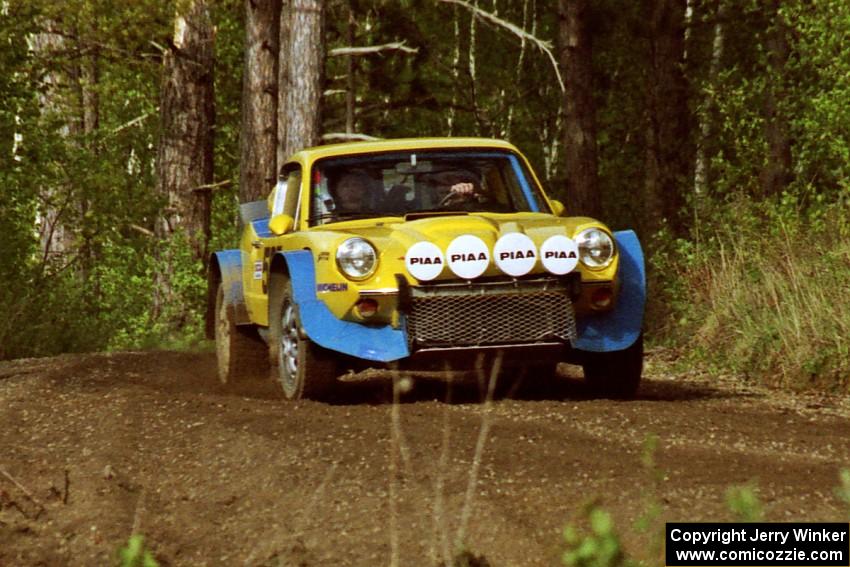 The Paul Moorman / Diane Sargent SAAB Sonett II at speed in the Two Inlets State Forest.