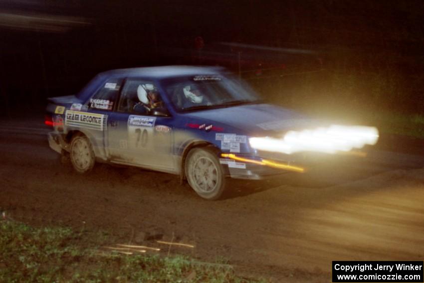 Kendall Russell / Russ Hughes at speed in their Dodge Shadow at the crossroads spectator location.