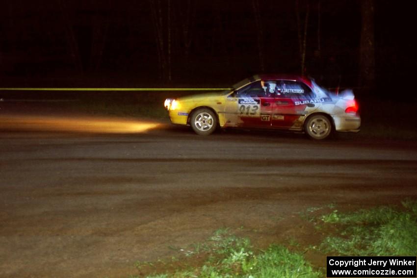 Janusz Jastrzebski / Kazimierz Pudelek at speed at the crossroads in their Subaru Impreza.