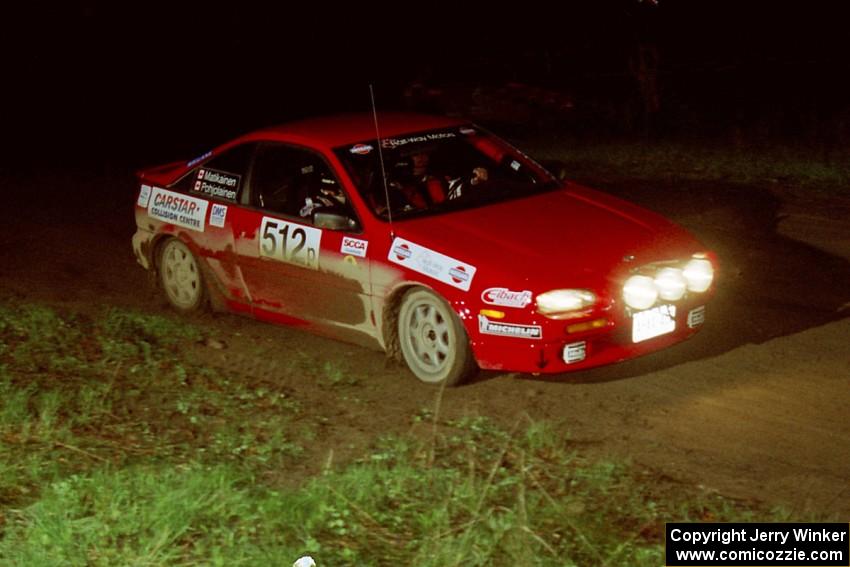 Jouni Pohjolainen / John Matikainen take the crossroads jump easily in their Nissan NX2000.