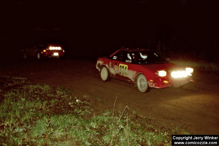 The Paul Dunn / Rebecca Dunn Toyota Celica All-trac chases the Randy Bailey / Will Perry Toyota MR2 at the crossroads.