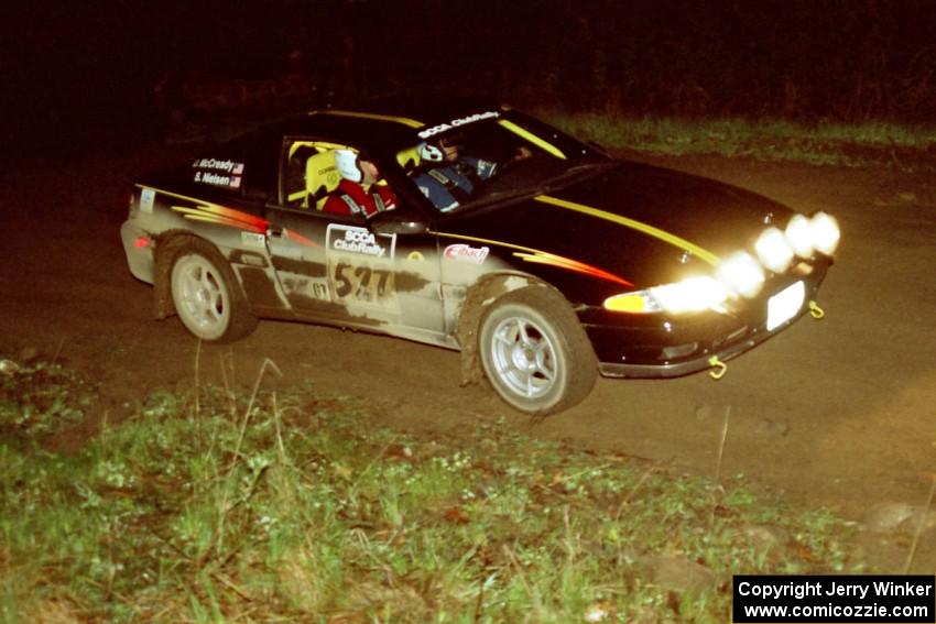 The Steve Nielsen / Jeff Burmeister Plymouth Laser goes past the spectator point at the crossroads.