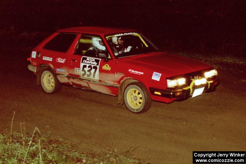 Paul Peters / Bob Anderson drive their Subaru GL past the crossroads spectator point.