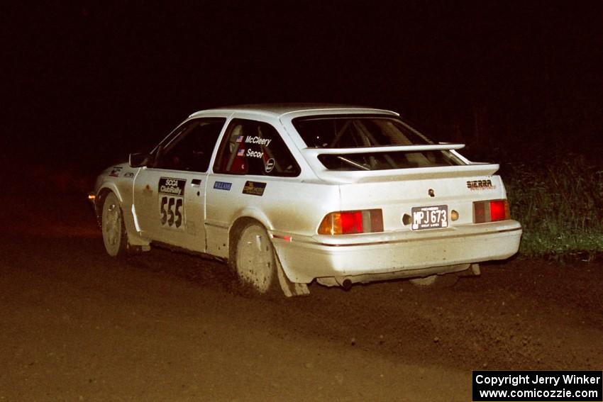 Colin McCleery / Jeff Secor drift their Merkur XR4Ti through a 90-right on the final stage.