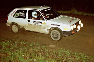 The Aaron Hatz / Brendan Higgins VW GTI at speed at the crossroads spectator point.