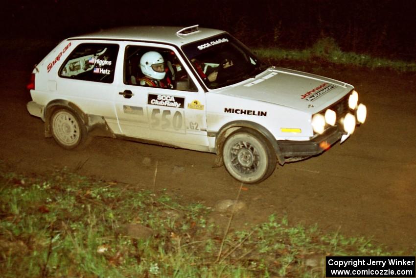 The Aaron Hatz / Brendan Higgins VW GTI at speed at the crossroads spectator point.