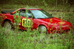 The Randy Bailey / Will Perry Toyota MR-2 off in the weeds tring to get back on the road.