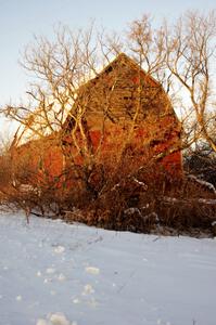 An old barn to the south of Rush City at sunset.