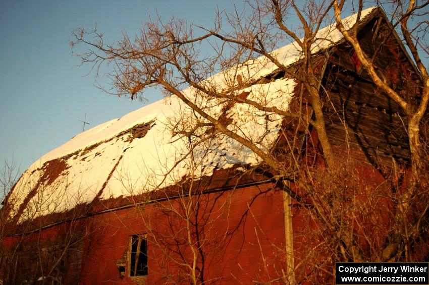 An old barn to the south of Rush City at sunset.