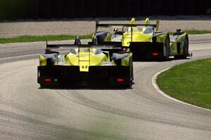 James French / Kyle Marcelli / Chapman Ducote Oreca FLM09 chases the similar car of Anthony Downs / Lucas Downs / Matt Downs