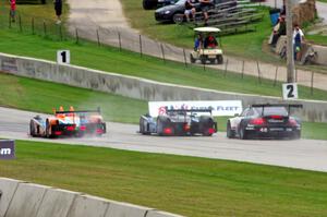 Rusty Mitchell / James French and David Cheng / Michael Guasch Oreca FLM09s with the Marco Holzer / Seth Neiman Porsche GT3 RSR 