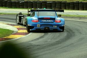 Wolf Henzler / Bryan Sellers Porsche GT3 RSR follows the Scott Tucker / Simon Pagenaud HPD ARX-03b Honda