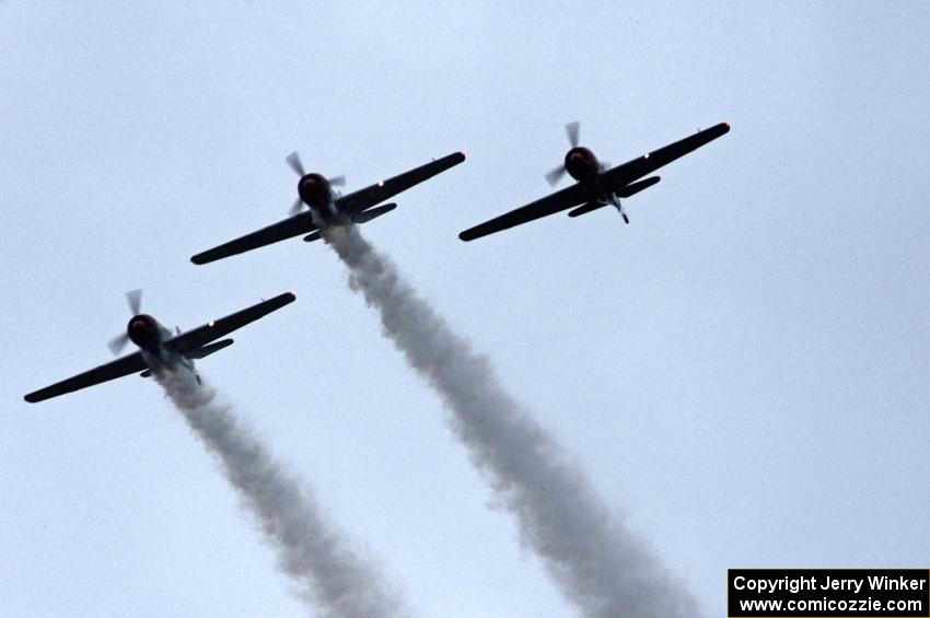 WWII trainer planes fly overhead before the race's start.