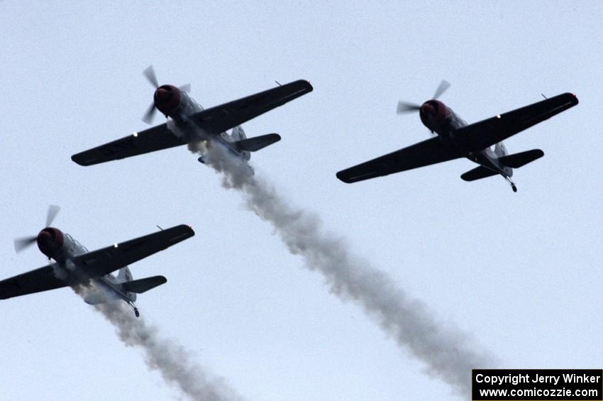 WWII trainer planes fly overhead before the race's start.