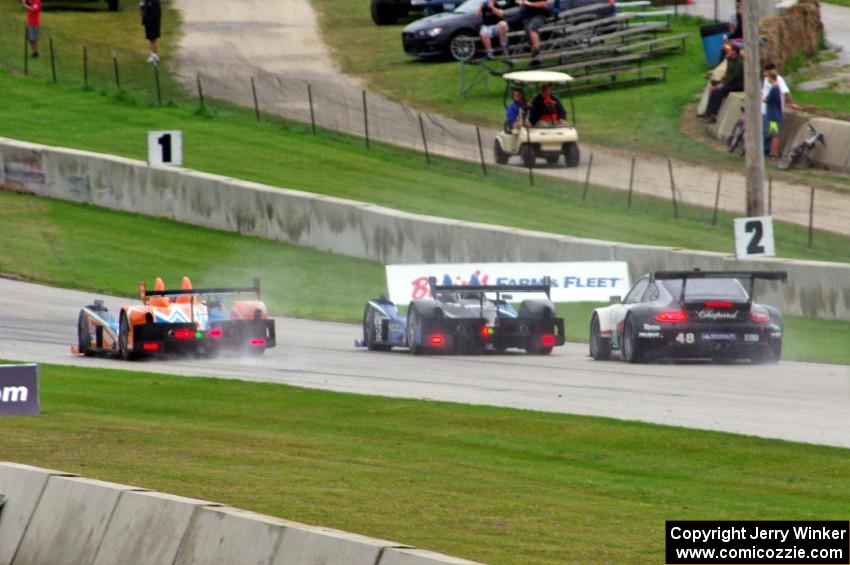 Rusty Mitchell / James French and David Cheng / Michael Guasch Oreca FLM09s with the Marco Holzer / Seth Neiman Porsche GT3 RSR 