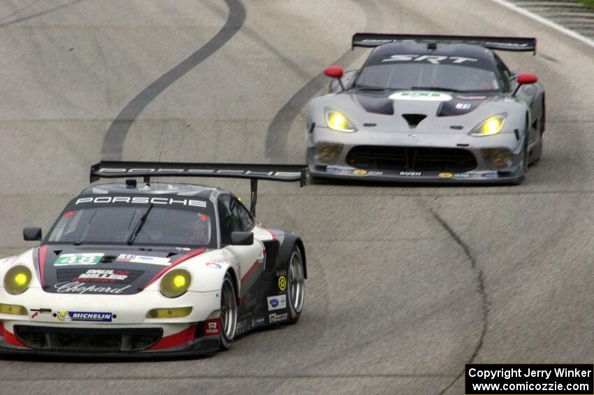 Marco Holzer / Seth Neiman Porsche GT3 RSR and Marc Goossens / Dominik Farnbacher SRT Viper GTS-R