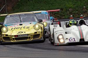 Bruno Junqueira / Duncan Ende Oreca FLM09 passes the Jan Heylen / Mike Hedlund Porsche GT3 Cup