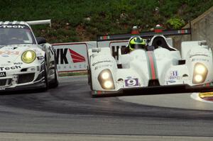 Bruno Junqueira / Duncan Ende Oreca FLM09 passes Jeroen Bleekemolen / Cooper MacNeil Porsche GT3 Cup