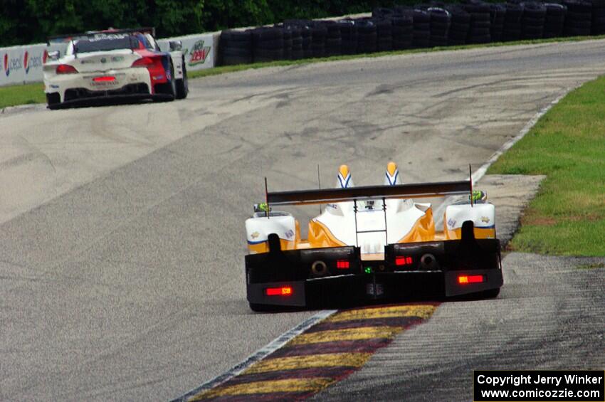 Mirco Schultis / Renger van der Zande Oreca FLM09 chases the John Edwards / Dirk Müller BMW Z4 GTE