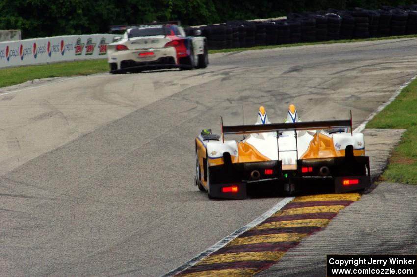 Mirco Schultis / Renger van der Zande Oreca FLM09 chases the John Edwards / Dirk Müller BMW Z4 GTE