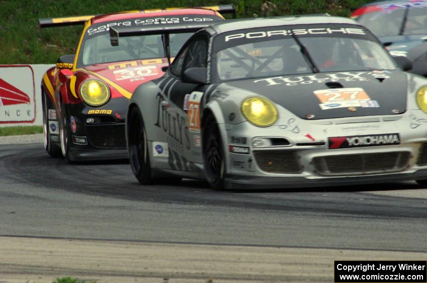 Patrick Dempsey / Andy Lally Porsche GT3 Cup and Henrique Cisneros / Sean Edwards Porsche GT3 Cups