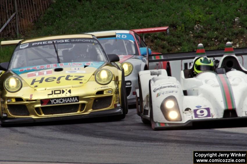 Bruno Junqueira / Duncan Ende Oreca FLM09 passes the Jan Heylen / Mike Hedlund Porsche GT3 Cup