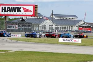 The field bunches up before turn 14 on the pace lap.