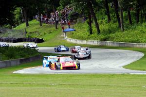 The field streams out of turn 12 into 13 on the first lap.