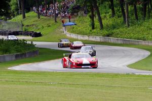 Alessandro Balzan / Leh Keen Ferrari F458 Italia leads the GT battle on the first lap