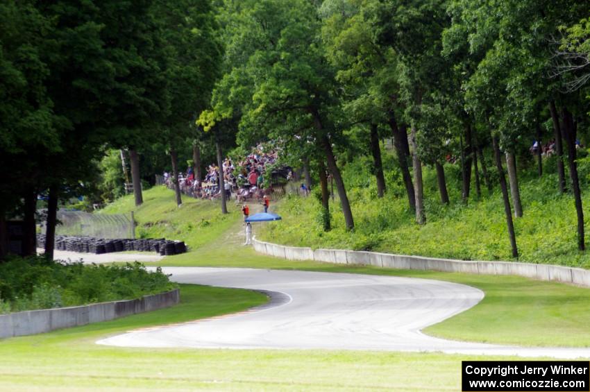 Turn 13 with the crowd at Canada Corner in the background.