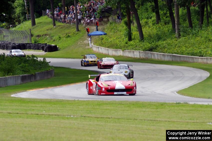 Alessandro Balzan / Leh Keen Ferrari F458 Italia leads the GT battle on the first lap