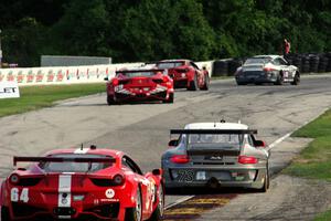 The GT class leaders head into turn 7 near the midpoint of the race.