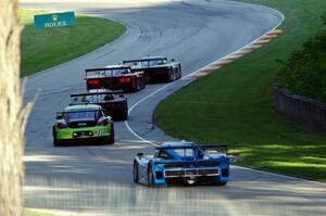 A stream of cars heads out of Canda Corner.