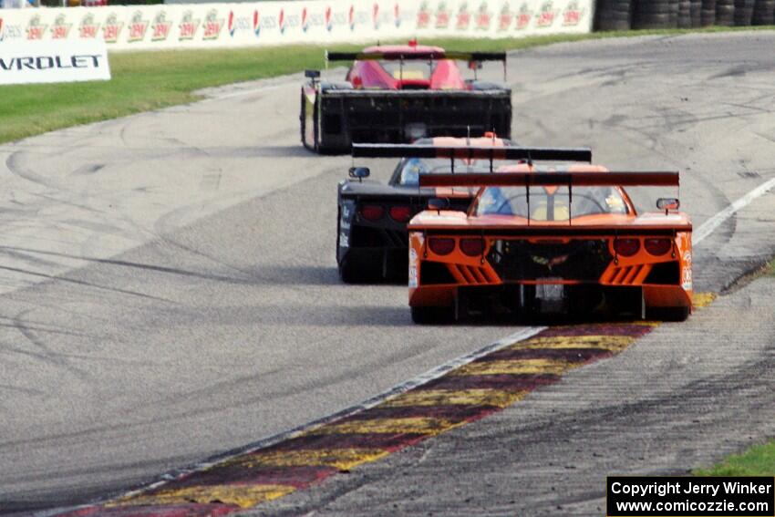 The leaders head into turn 7 near the midpoint of the race.