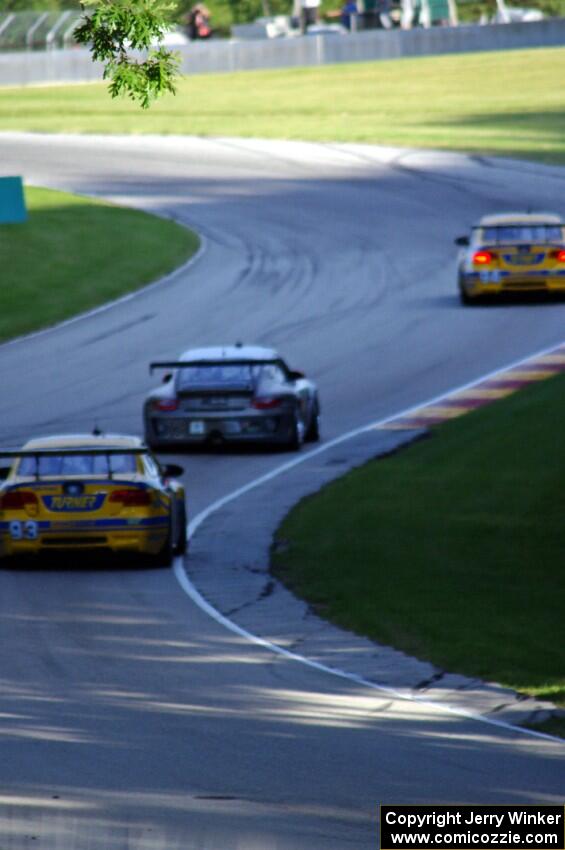 Bill Auberlen / Paul Dalla Lana / Billy Johnson BMW M3 and Patrick Lindsey / Patrick Long Porsche GT3 Cup battle in GT class