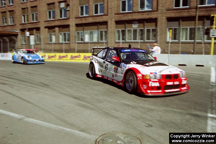 Peter Cunningham / Brian Simo BMW M3 and Darren Law / Danny Marshall Porsche 911 Carrera RSR