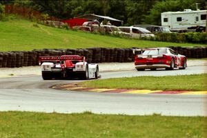 Didier Theys / Fredy Lienhard / Mauro Baldi Ferrari 333SP/Judd chases the Andy McNeil / Doug Mills / Kerry Hitt Chevy Camaro
