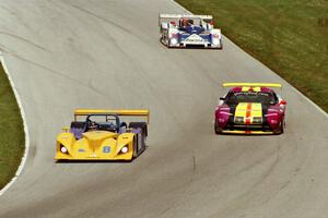 Butch Leitzinger / Scott Schubot Lola B2K/10 Ford and two others head into turn 7