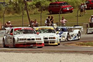 Two BMWs and a Riley & Scott Mk. III at turn 5