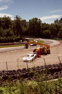 Steve Pelke / Bruce Nesbitt / Paul Jenkins Ford Mustang are pulled from the gravel pit at Canada Corner