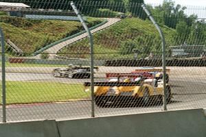 Four SP and SPII cars come into turn 5