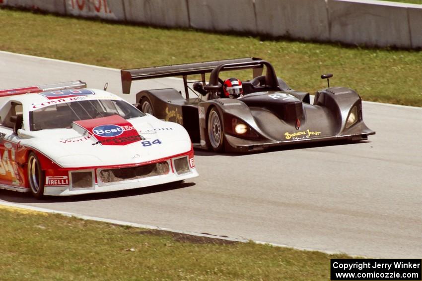 Jon Field / Oliver Gavin Lola B2K/10 Judd passes the Andy McNeil / Doug Mills / Kerry Hitt Chevy Camaro