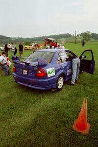 Peter Cunningham / Jim Gill Mitsubishi Lancer Evo VI in line for tech inspection.