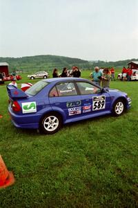 Peter Cunningham / Jim Gill Mitsubishi Lancer Evo VI in line for tech inspection.