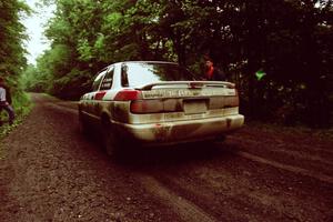 Ted Mendham / Lise Mendham Nissan Sentra SE-R launches from the start of the practice stage.