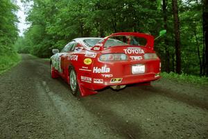 Ralph Kosmides / Ken Cassidy Toyota Supra Turbo launches from the start of the practice stage.