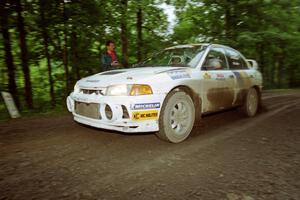 Pete Lahm / Matt Chester Mitsubishi Lancer Evo IV launches from the start of the practice stage.